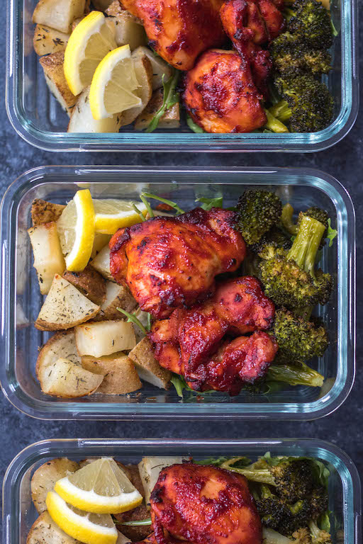 This Whole30 sheet pan BBQ chicken thighs and roasted vegetables recipe is perfect for healthy meal prep, or an easy paleo, gluten-free weeknight dinner. It doesn’t get much more simple than only using one pan, having no clean up but ending up with plenty of meal prep for the week that has tons of flavor! #whole30sheetpan #paleosheetpan #whole30mealprep #whole30bbqchicken