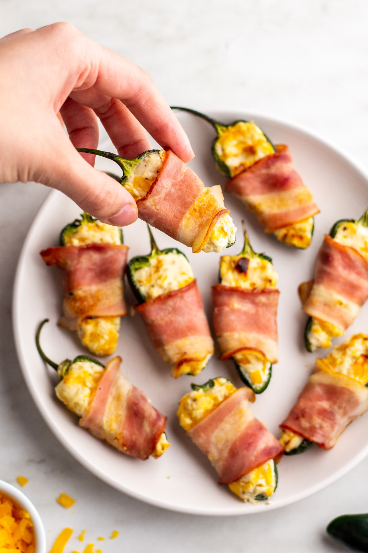 https://www.wholekitchensink.com/wp-content/uploads/2023/01/Air-Fryer-Bacon-Wrapped-Jalapeno-Poppers-15.jpg